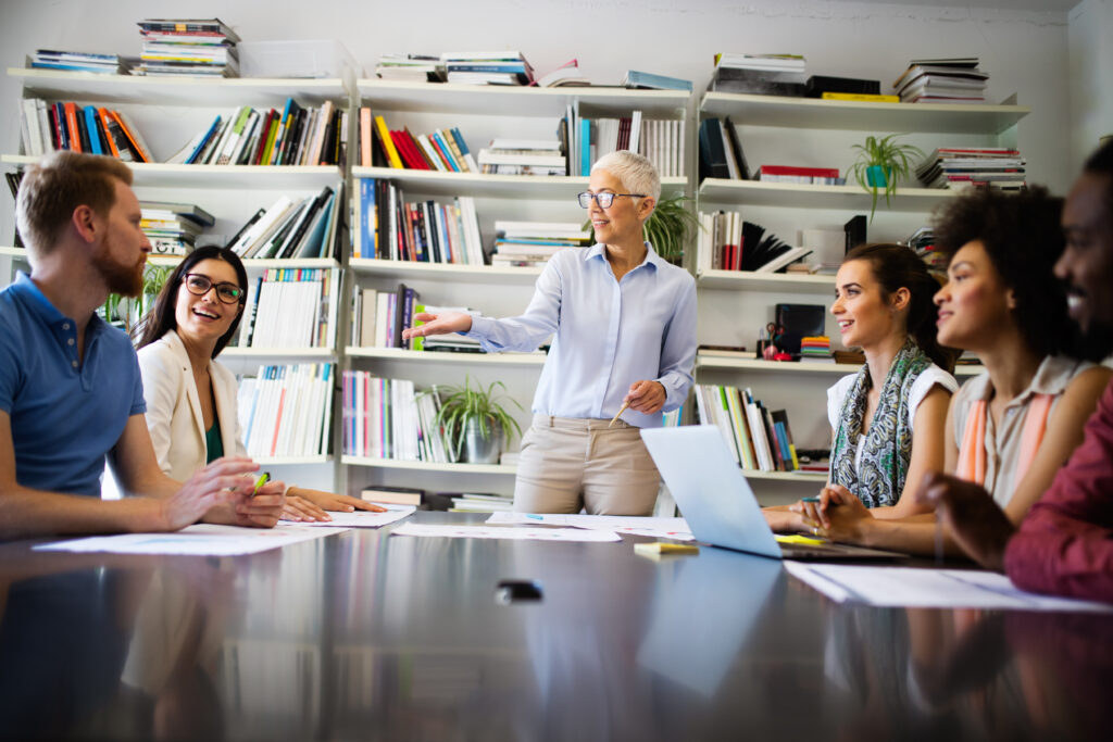 Collaboration and analysis by business people working in office