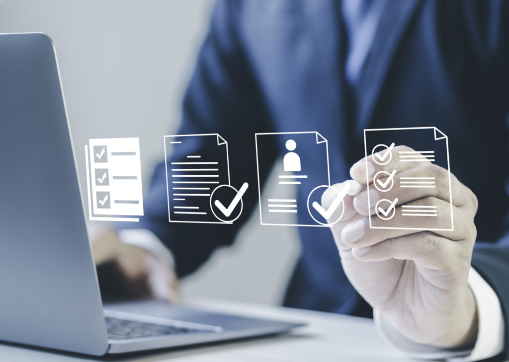 Businessman filling out employee evaluation form online Human resource management (HR), human resource management concepts, HR, recruiting, leadership and team building