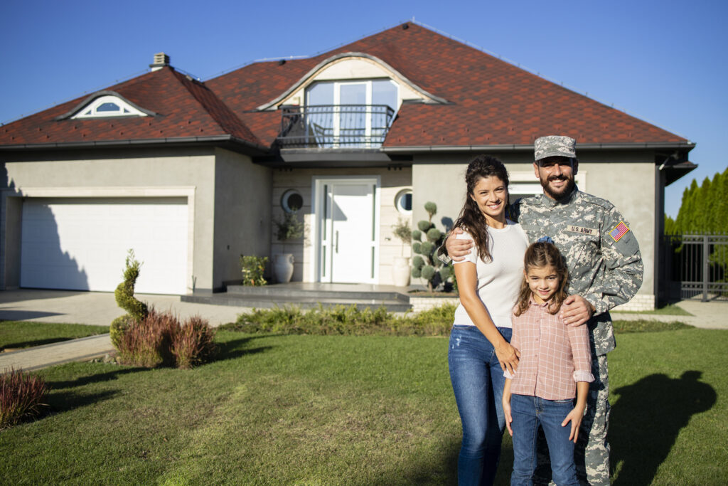 Portrait of happy american military family welcoming father soldier coming home.