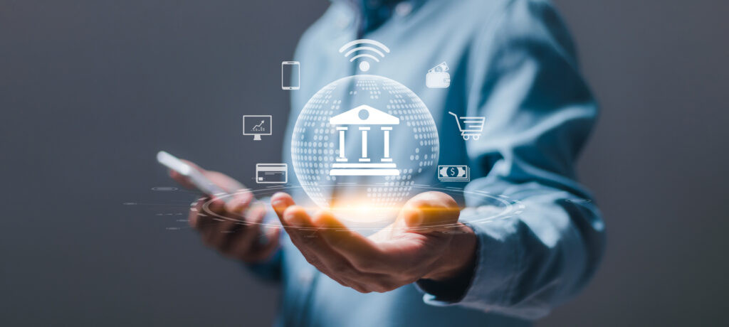 Online banking concept. Businessman using smart phone with virtual screen of online banking digital technology, payment for shopping and digital technology business, Finance and banking network.