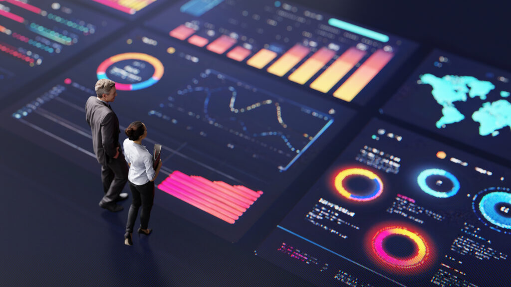 Business Team Analyzing Interactive Digital Dashboards with Data Visualizations